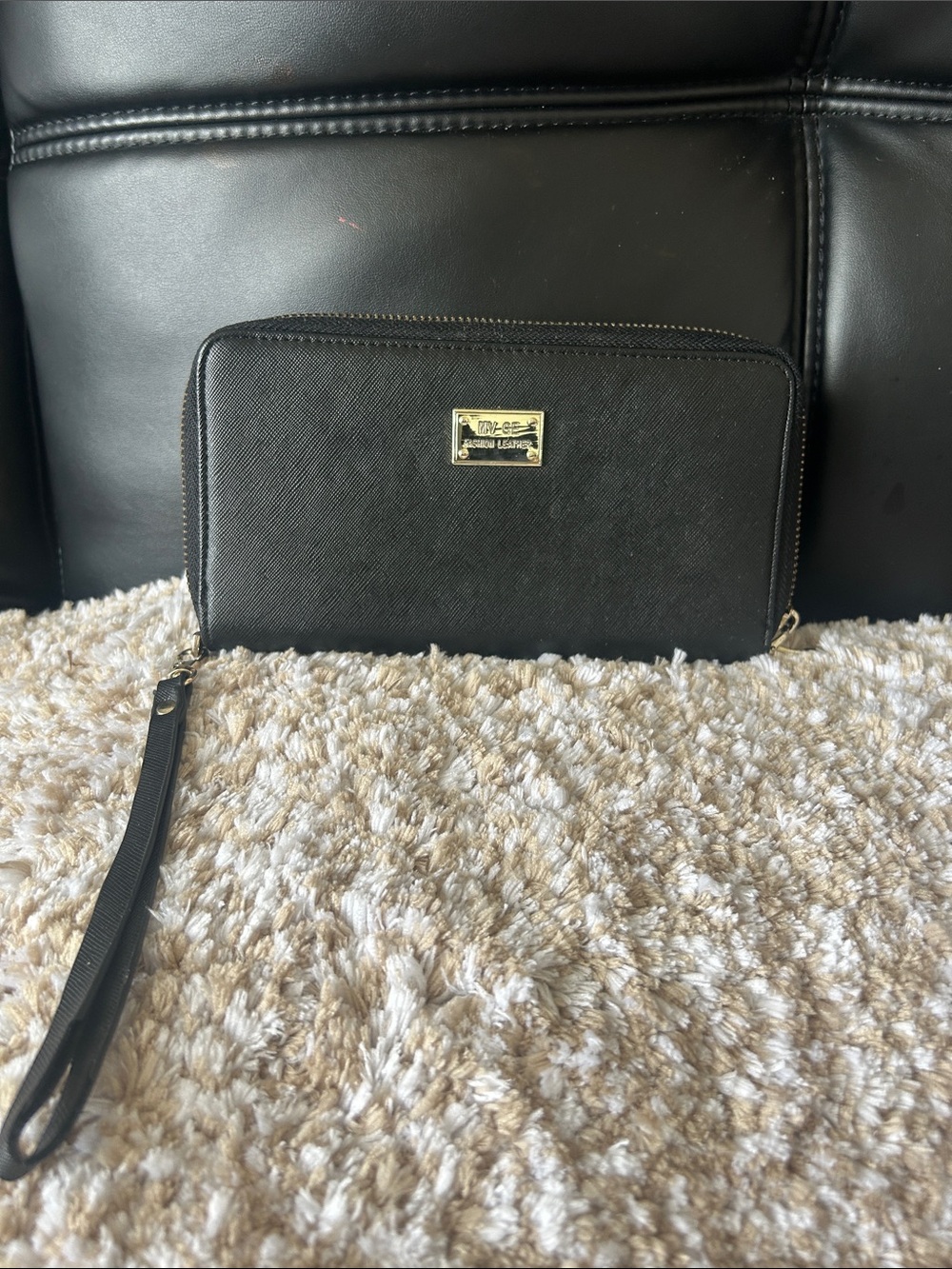 Black Zip-Around Wallet with Gold Plate Accent